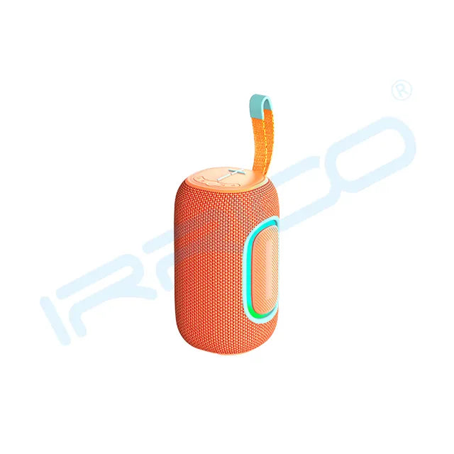 A red cylindrical portable speaker with a textured mesh body, a glowing cyan oval light accent on the side, a wooden-textured top panel, and an orange fabric carrying strap with a blue accent.
