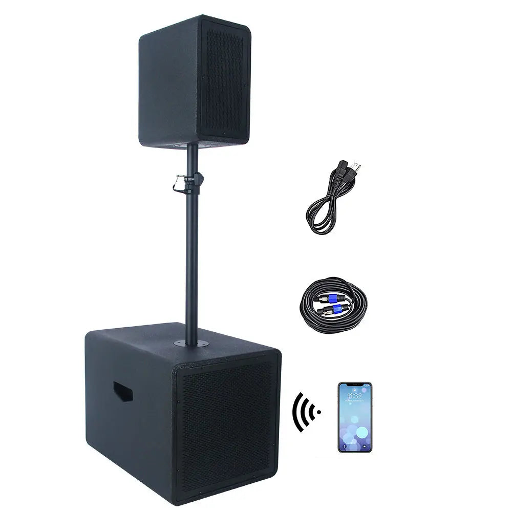 A black portable PA system consisting of a large rectangular subwoofer with a smaller speaker mounted on a pole, displayed alongside accessories including a coiled power cable, a coiled audio cable, and an icon showing a smartphone connected via Bluetooth.