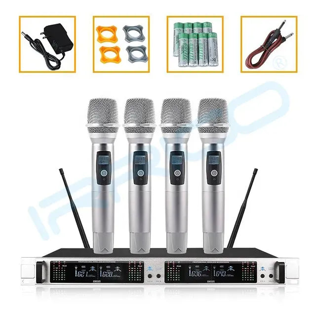 A four-channel wireless microphone system featuring four handheld mics placed on a black and silver receiver unit, with inset images displaying included accessories such as a power supply, rubber mounts, batteries, and an audio cable.