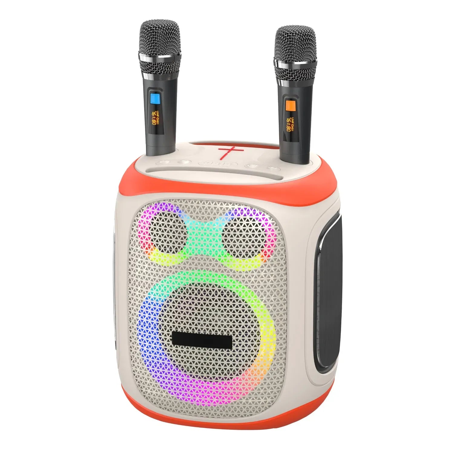 Front view of a portable karaoke speaker system featuring a white and orange body, two wireless microphones with blue and orange digital displays standing in top slots, and a front grille with two tweeters and a larger woofer, all outlined by vibrant, swirling rainbow-colored LED light rings