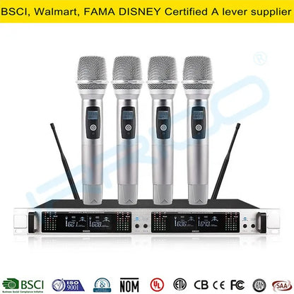 A professional four-channel wireless microphone system featuring four handheld dynamic microphones placed on top of a silver 19-inch rack-mountable receiver unit with LED displays and control buttons.