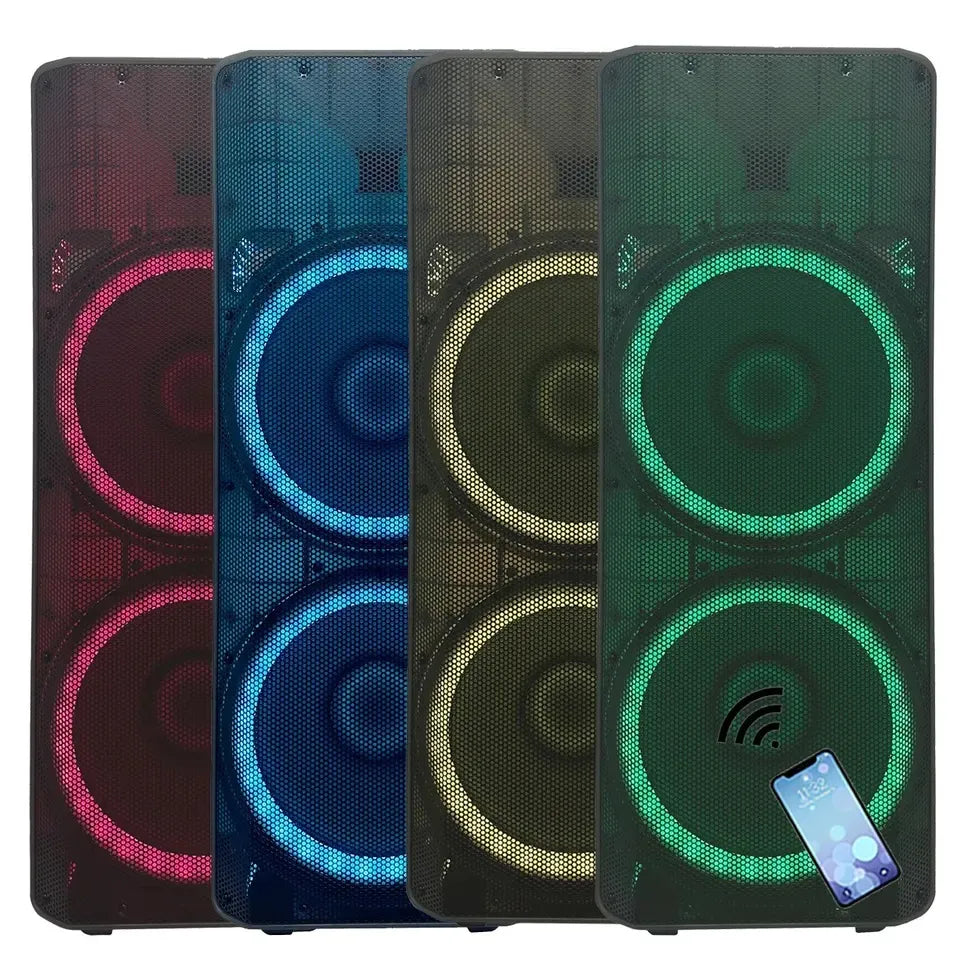 Four tall, rectangular portable speakers standing side-by-side, each enclosed in a black mesh grille with two large circular drivers illuminated by vibrant RGB lighting in pink, blue, yellow, and green from left to right; a smartphone displaying a music player interface hovers near the bottom right speaker, indicating Bluetooth connectivity.