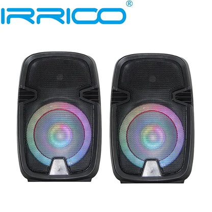 Two identical black rectangular portable speakers positioned side-by-side, each featuring a colorful RGB light ring around the central driver that emits a rainbow gradient glow, with a small triangular passive radiator at the bottom, set against a plain white background.