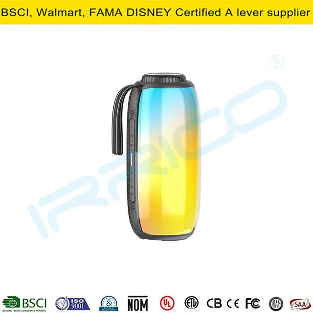 A tall portable cylindrical speaker with a translucent shell displaying a blue-to-yellow gradient light effect, featuring a black screw-top lid and a flexible black strap on the side.