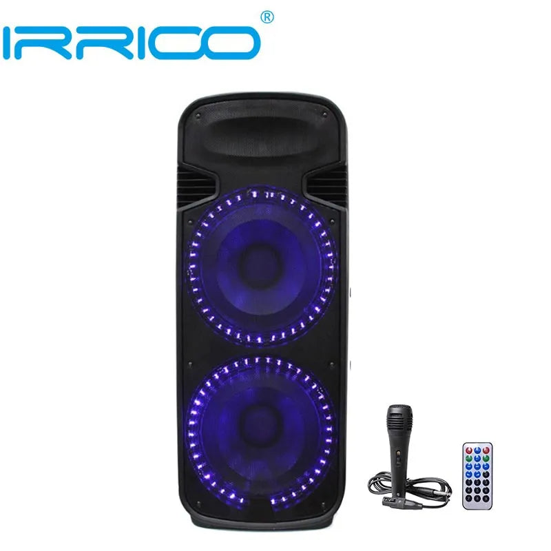 Front view of a tall, black portable speaker featuring two large circular woofers illuminated with vibrant blue LED ring lights, accompanied by a handheld microphone with a cable and a remote control placed to the right.