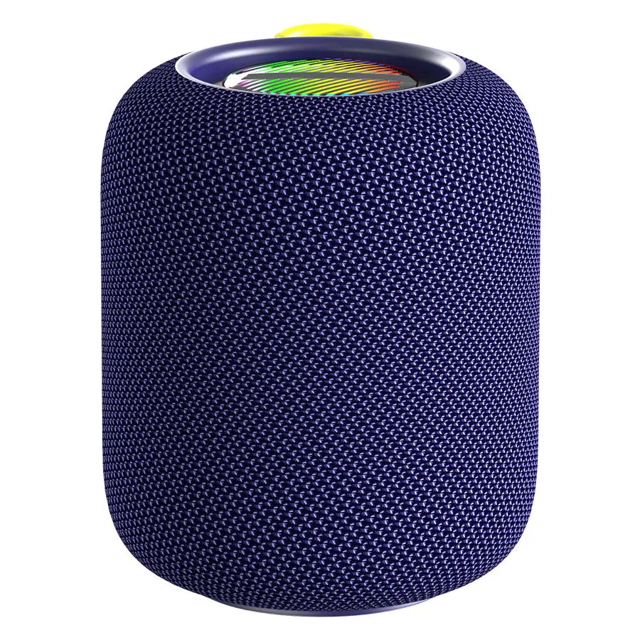 A dark navy blue cylindrical portable speaker with a textured, woven fabric exterior and a visible colorful RGB light ring at the top, partially obscured by a bright yellow fabric loop handle.