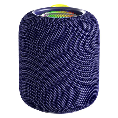 A dark navy blue cylindrical portable speaker with a textured, woven fabric exterior and a visible colorful RGB light ring at the top, partially obscured by a bright yellow fabric loop handle.