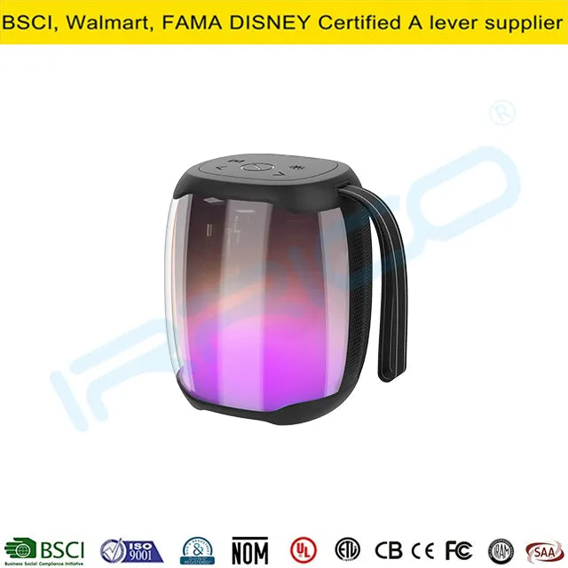 A portable cylindrical lantern-style speaker with a translucent purple and pink glowing body, a black top lid featuring control buttons, and a built-in black handle on the side