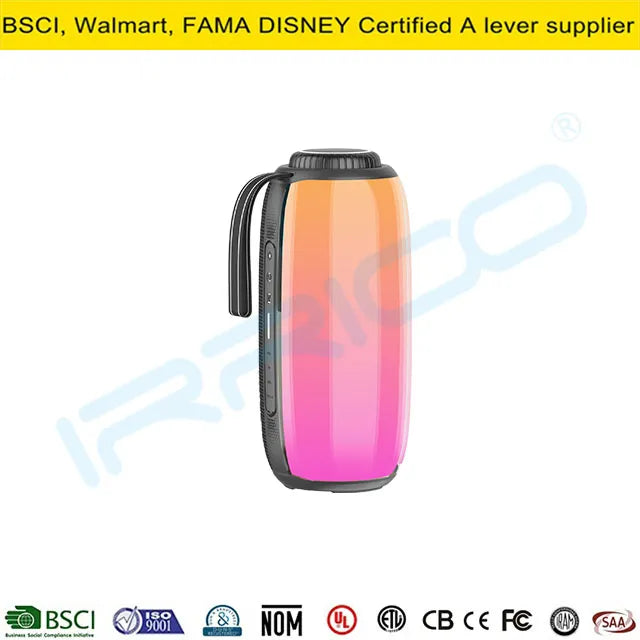 A portable cylindrical water bottle-shaped Bluetooth speaker with a vibrant orange-to-pink gradient finish, black screw-top lid, textured side grips, and a black wrist strap.