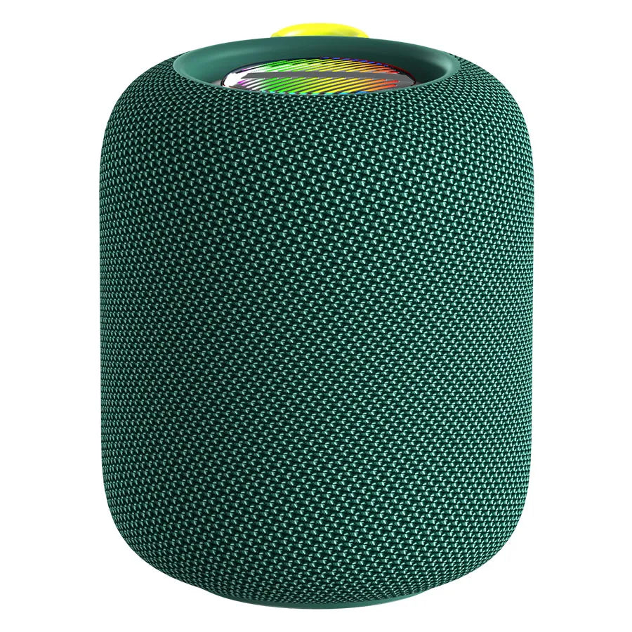 A dark green cylindrical portable speaker with a textured, woven fabric exterior and a visible colorful RGB light ring at the top, partially obscured by a bright yellow fabric loop handle.