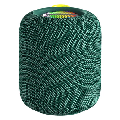 A dark green cylindrical portable speaker with a textured, woven fabric exterior and a visible colorful RGB light ring at the top, partially obscured by a bright yellow fabric loop handle.