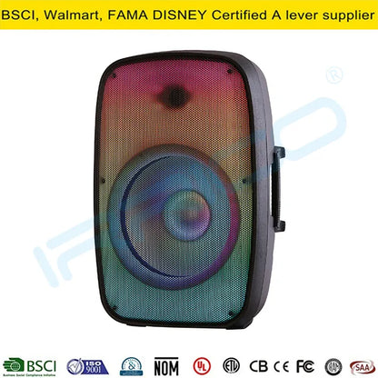 Front view of a compact portable speaker with a rounded rectangular design, featuring a concentric circular speaker grille illuminated by dynamic rainbow RGB lighting that transitions from red and pink at the top to blue and green at the bottom.