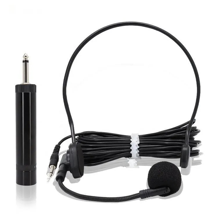 Headset microphone system with an over-the-head band and a flexible boom microphone, accompanied by a separate black cylindrical inline amplifier or battery box, and a 3.5mm jack adapter.
