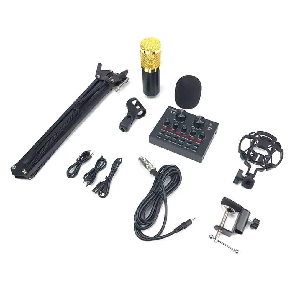 A complete podcasting and streaming kit laid out on a white background, featuring a gold-and-black condenser microphone, a foldable tripod desk stand, a V8 live sound card with various control knobs and buttons, a shock mount, a pop filter, and several audio cables.