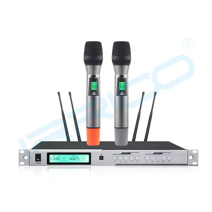 A dual-channel UHF wireless microphone system featuring two handheld mics with digital displays and four antennas, mounted on a professional rack-mountable receiver unit with an LCD screen