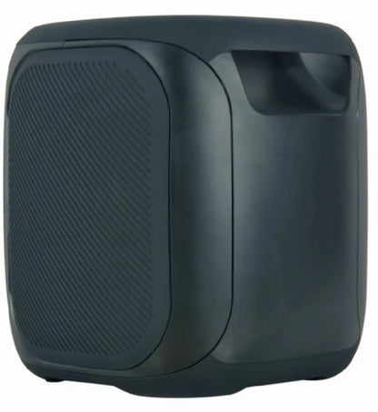 Side view of a compact dark grey portable speaker, featuring a textured speaker grille on one side and a smooth, glossy panel on the other, with rounded edges and small visible feet at the base.